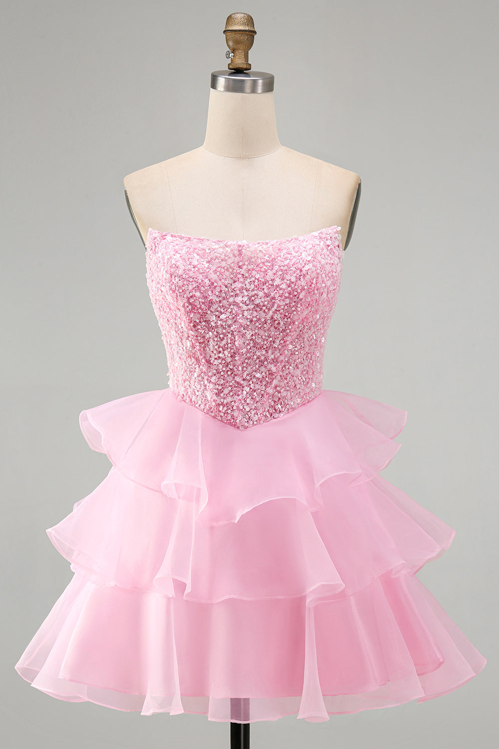 Robe de bal courte trapèze rose pailletée à sequins, perles et volants à niveaux
