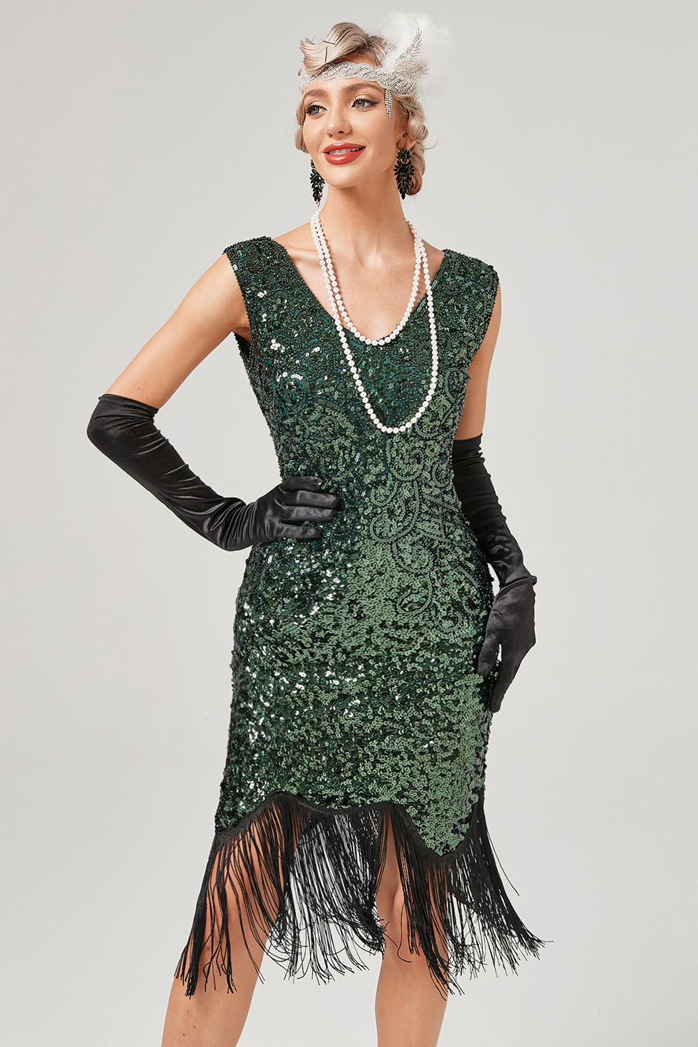 Robe Gatsby à paillettes vert foncé, col en V et franges
