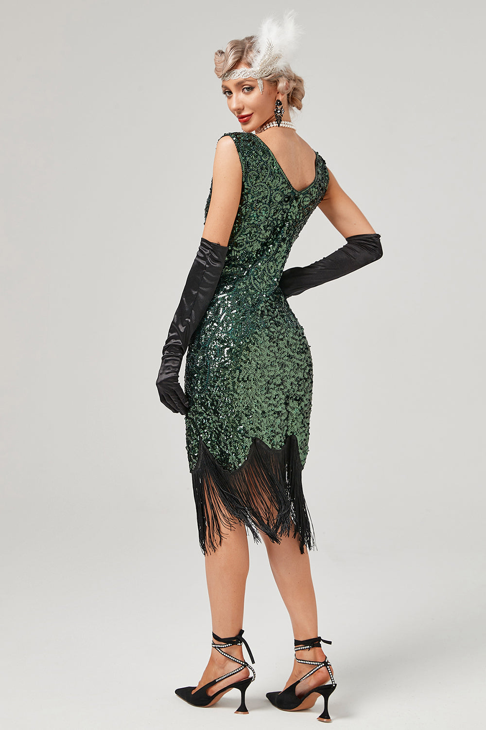 Robe Gatsby à paillettes vert foncé, col en V et franges
