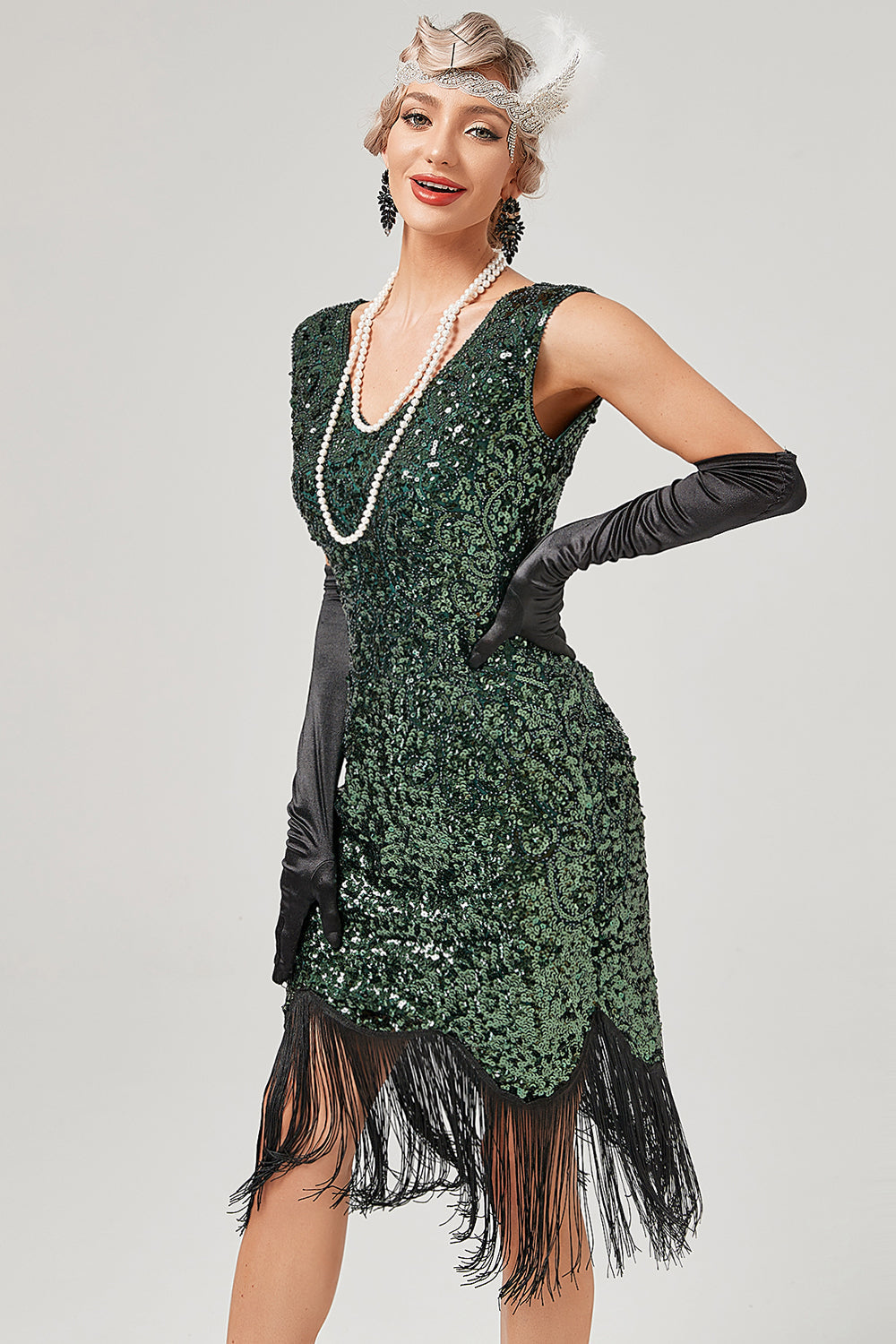 Robe Gatsby à paillettes vert foncé, col en V et franges