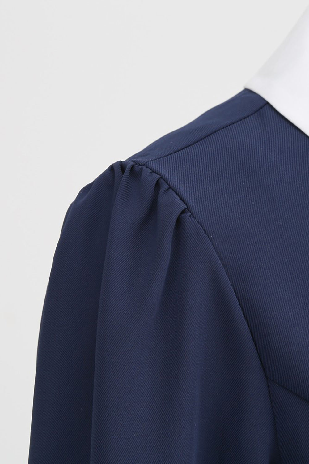 Robe bleu marine des années 50 à encolure ronde avec nœud papillon