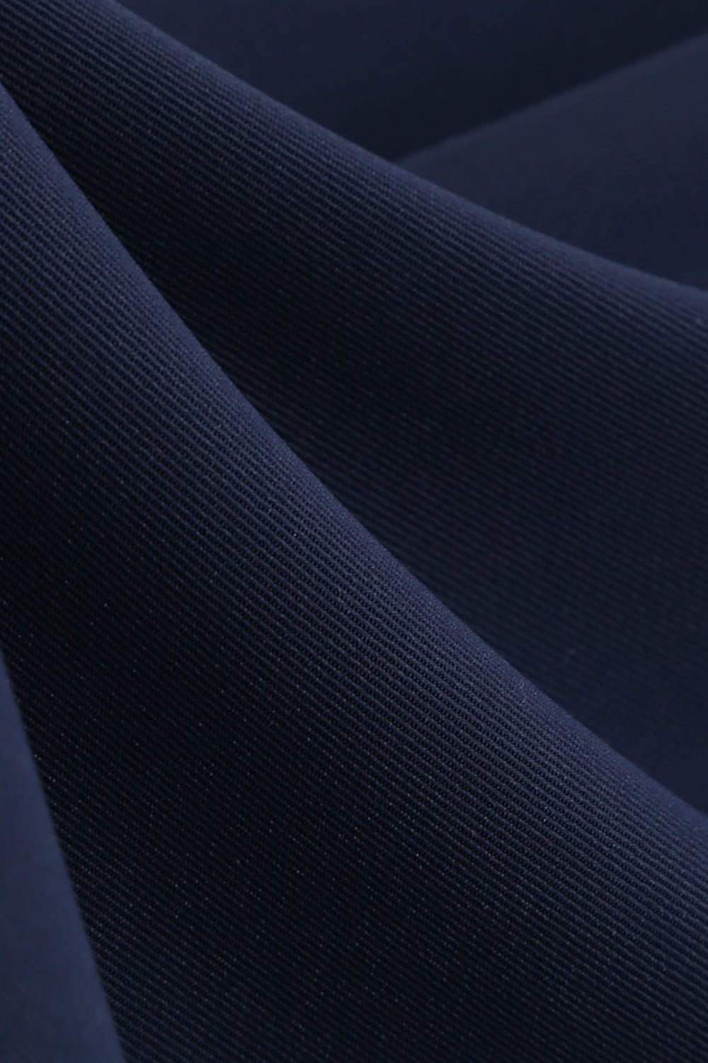 Robe bleu marine des années 50 à encolure ronde avec nœud papillon