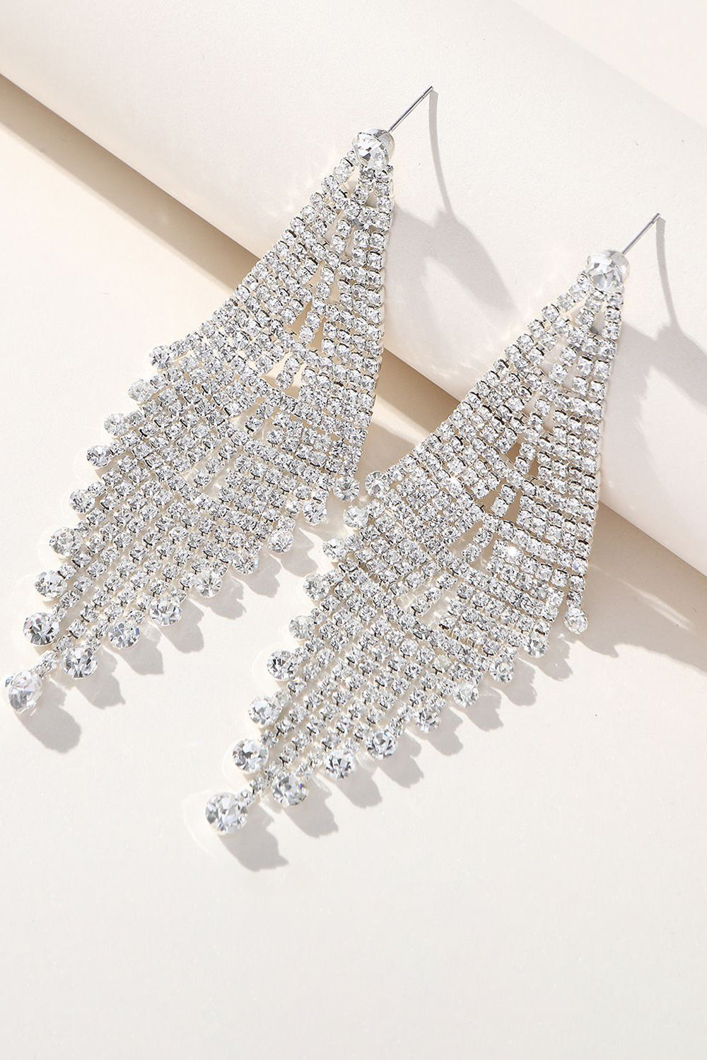 Pendientes largos de brillantes de plata con pedrería