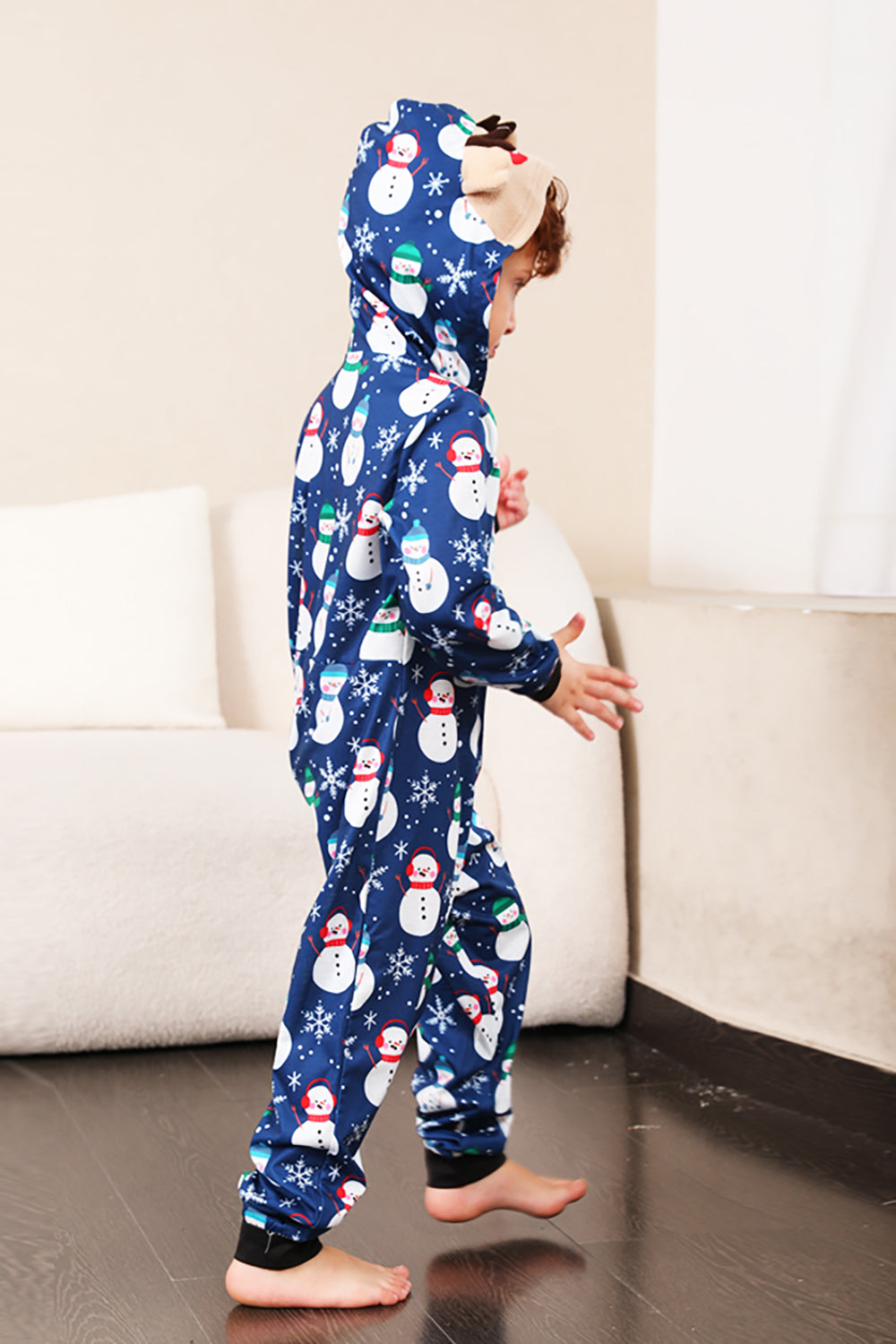 Pyjama de Noël une pièce bleu motif bonhomme de neige assorti pour toute la famille