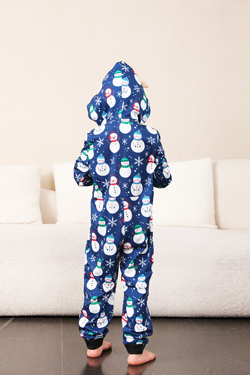 Pyjama de Noël une pièce bleu motif bonhomme de neige assorti pour toute la famille