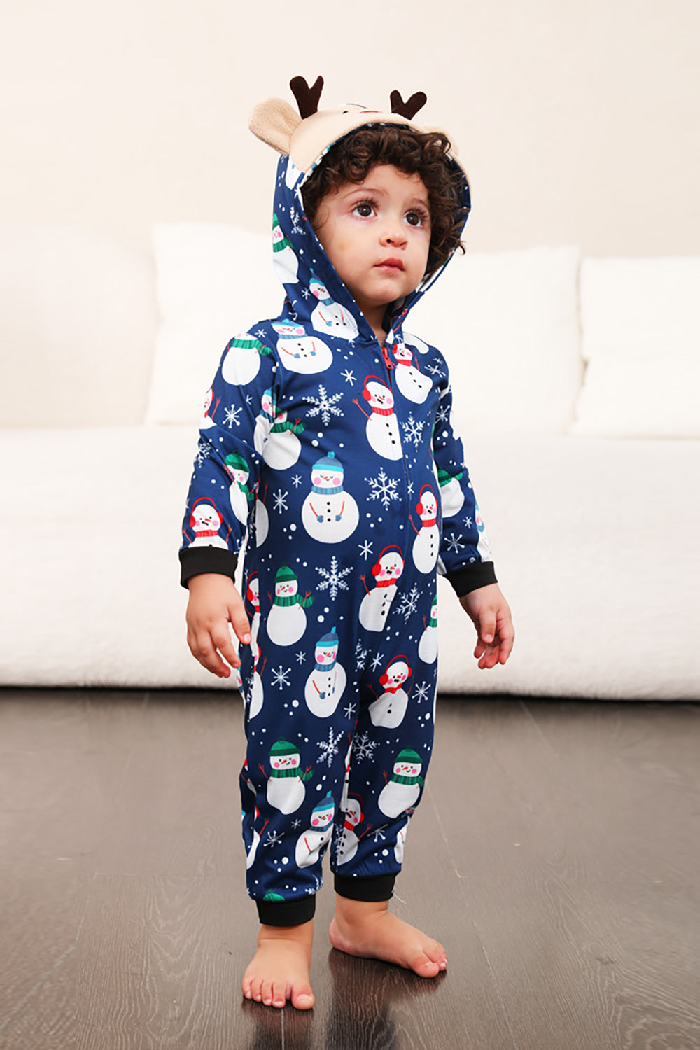Pyjama de Noël une pièce bleu motif bonhomme de neige assorti pour toute la famille