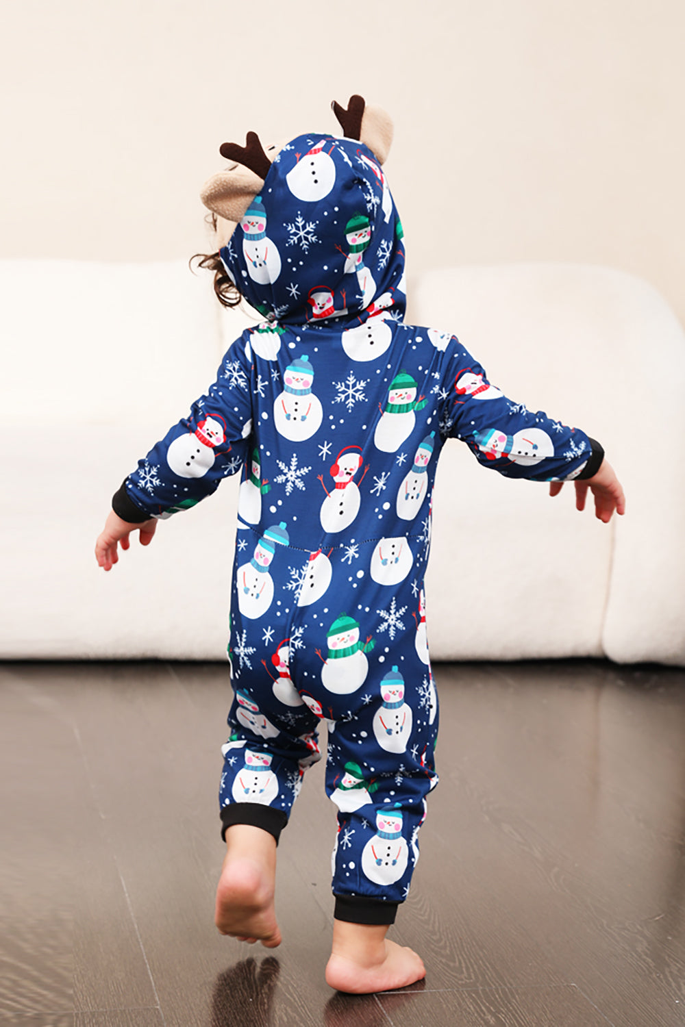 Pyjama de Noël une pièce bleu motif bonhomme de neige assorti pour toute la famille