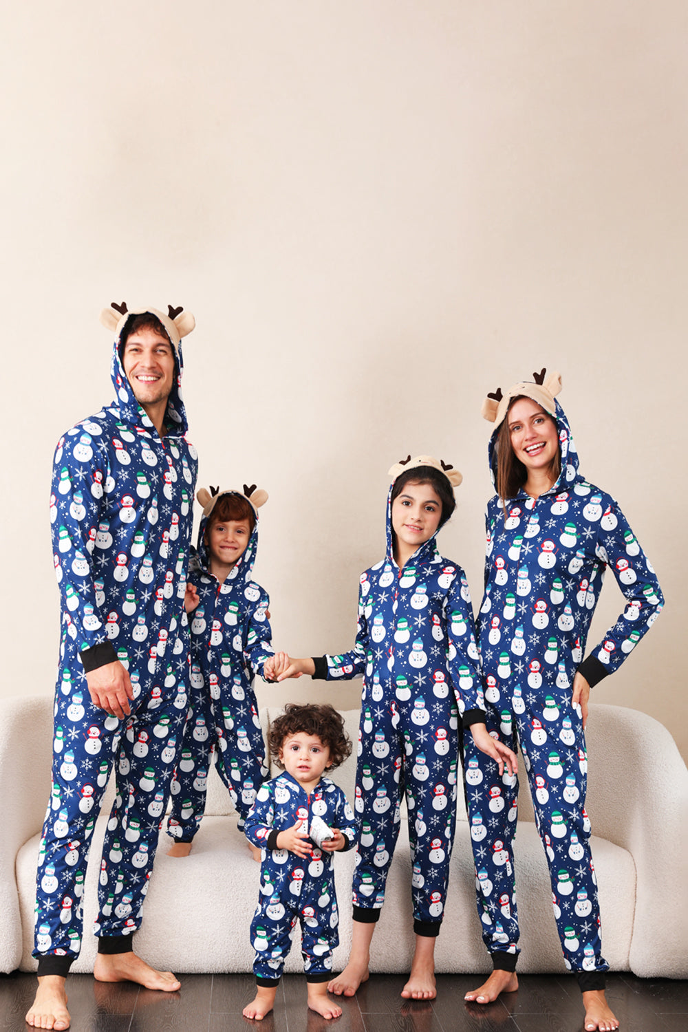 Pyjama de Noël une pièce bleu motif bonhomme de neige assorti pour toute la famille