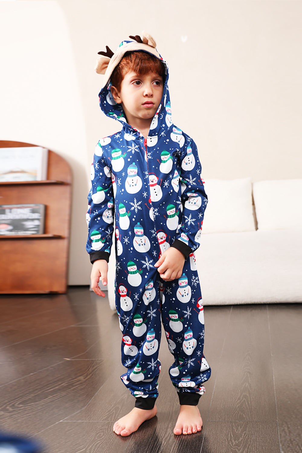Pyjama de Noël une pièce bleu motif bonhomme de neige assorti pour toute la famille