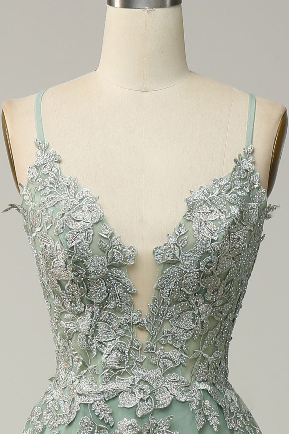 Robe de bal longue verte à fines bretelles et dos croisé