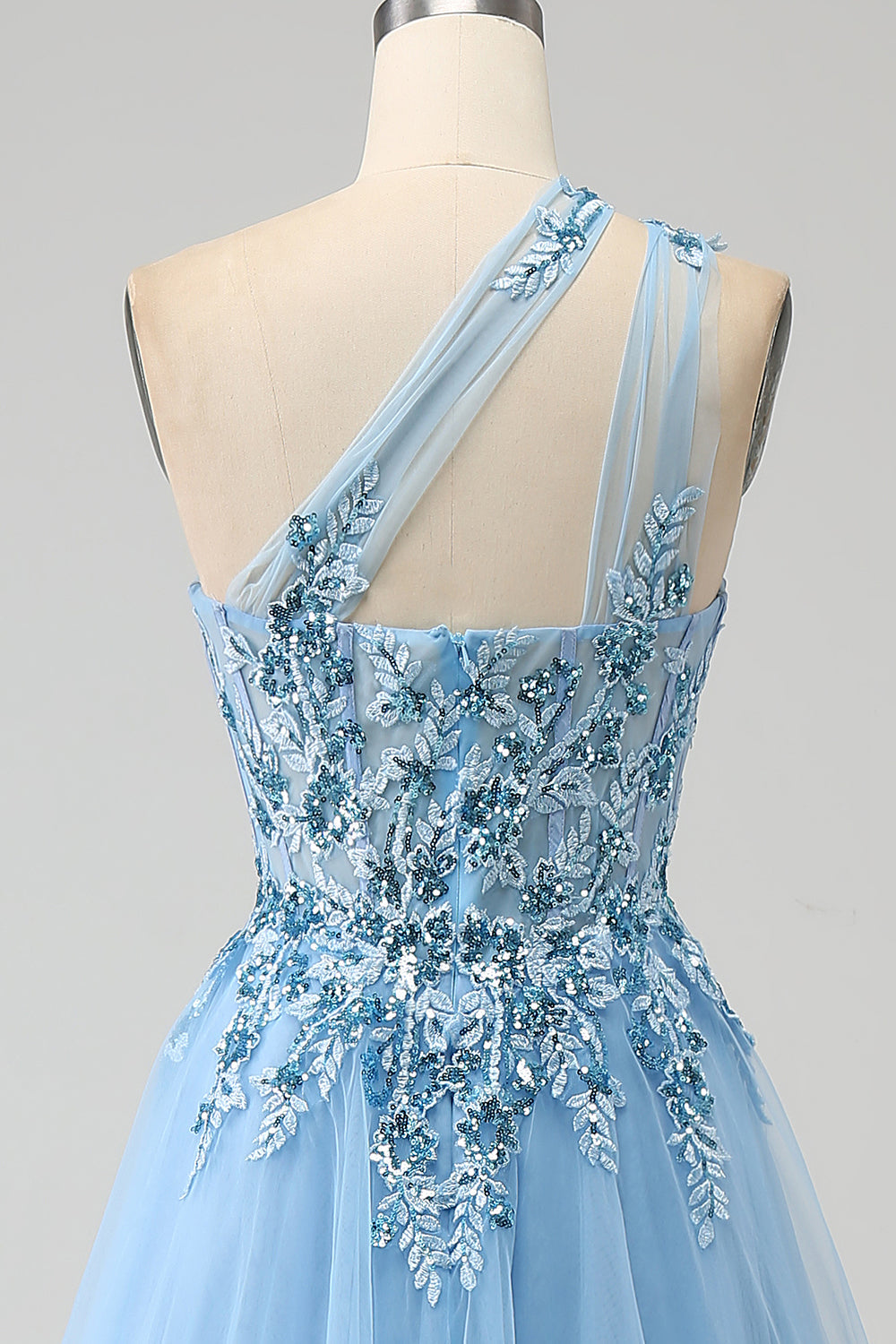 Robe de bal asymétrique bleu clair avec paillettes et appliqués