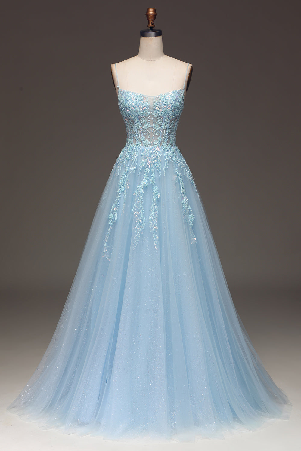 Robe de bal fuschia ligne A à fines bretelles avec appliques