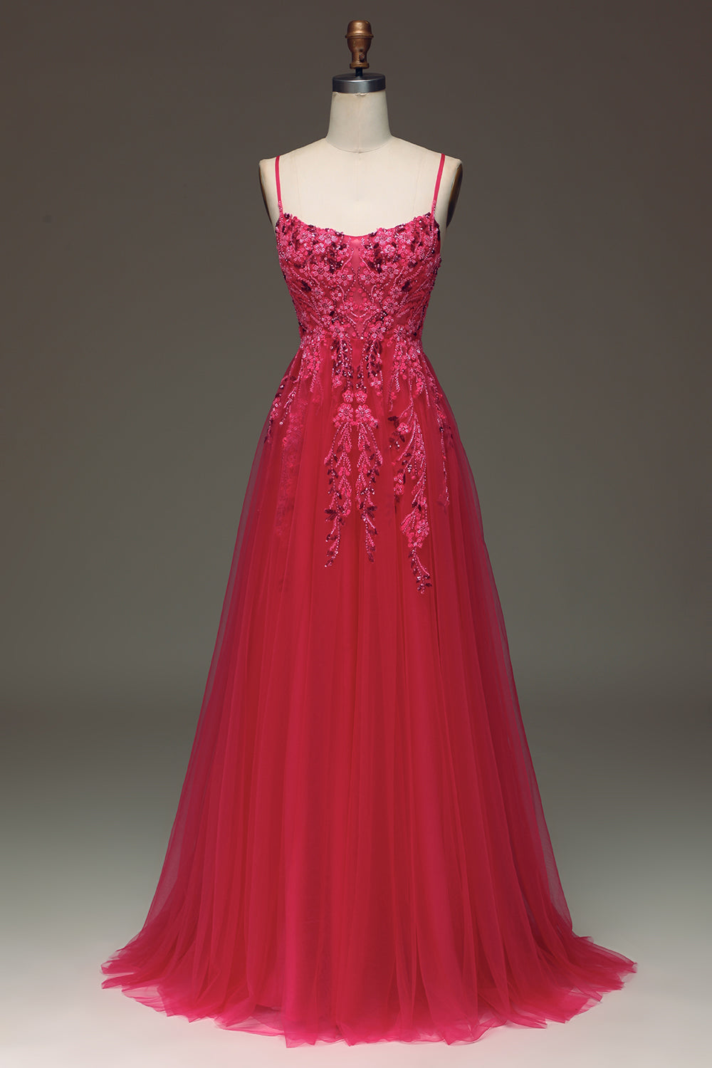 Robe de bal fuschia ligne A à fines bretelles avec appliques