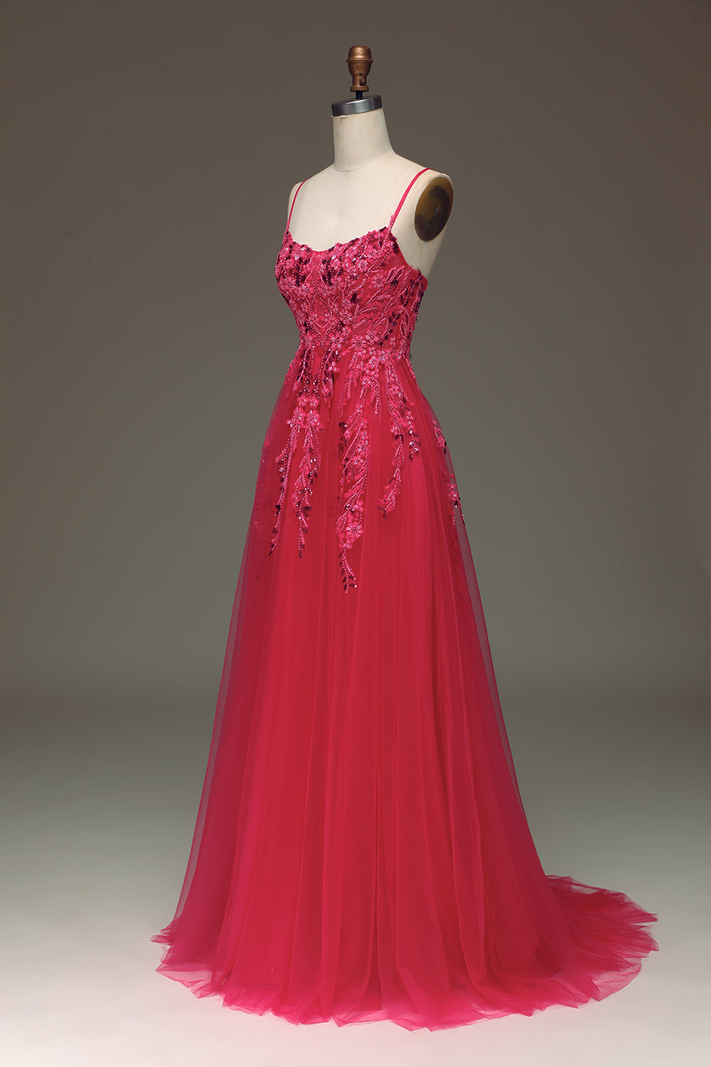 Robe de bal fuschia ligne A à fines bretelles avec appliques
