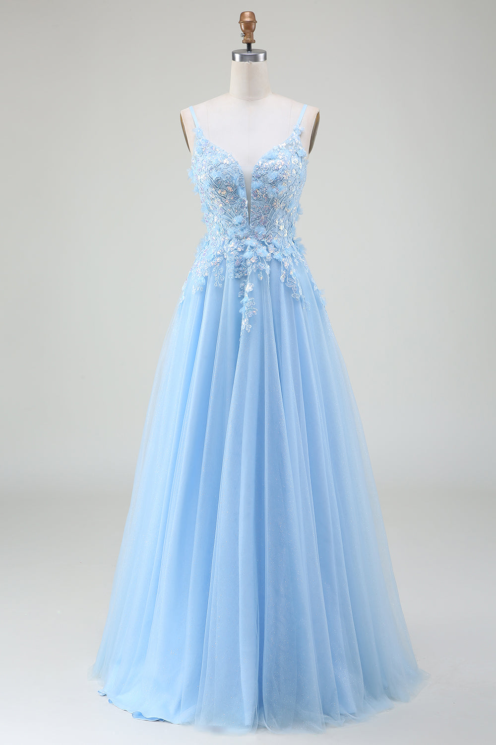 Robe de bal trapèze bleu clair avec appliques