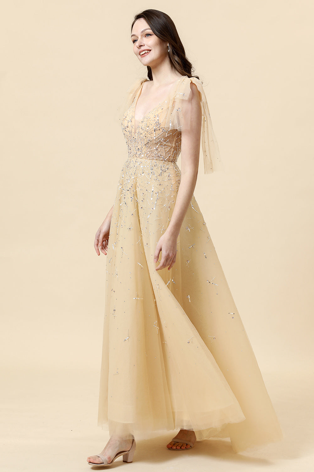 Robe de soirée trapèze ornée de perles jaunes scintillantes