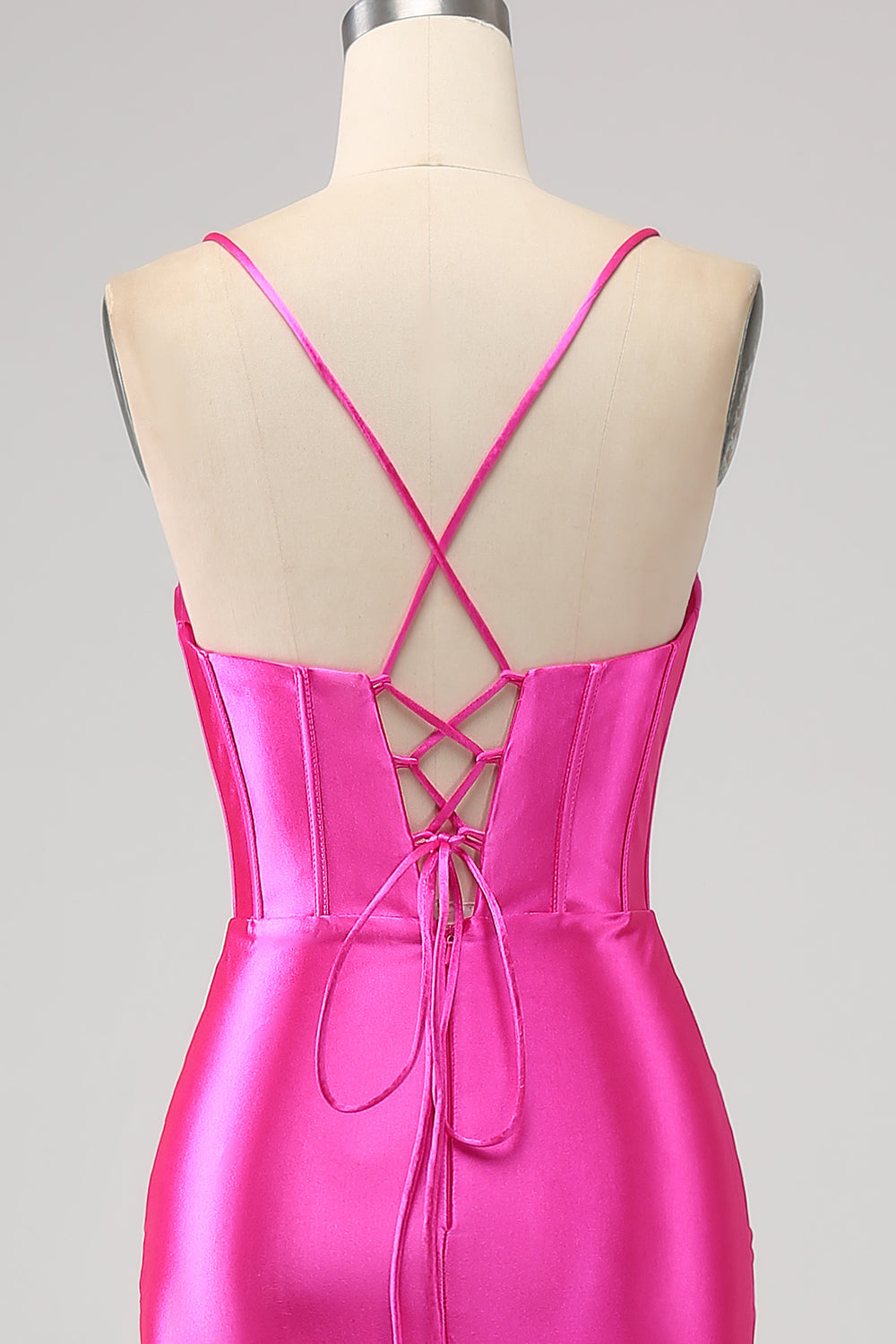Superbe robe de bal fuchsia sirène avec corsage et bretelles spaghetti, et fente sur le devant