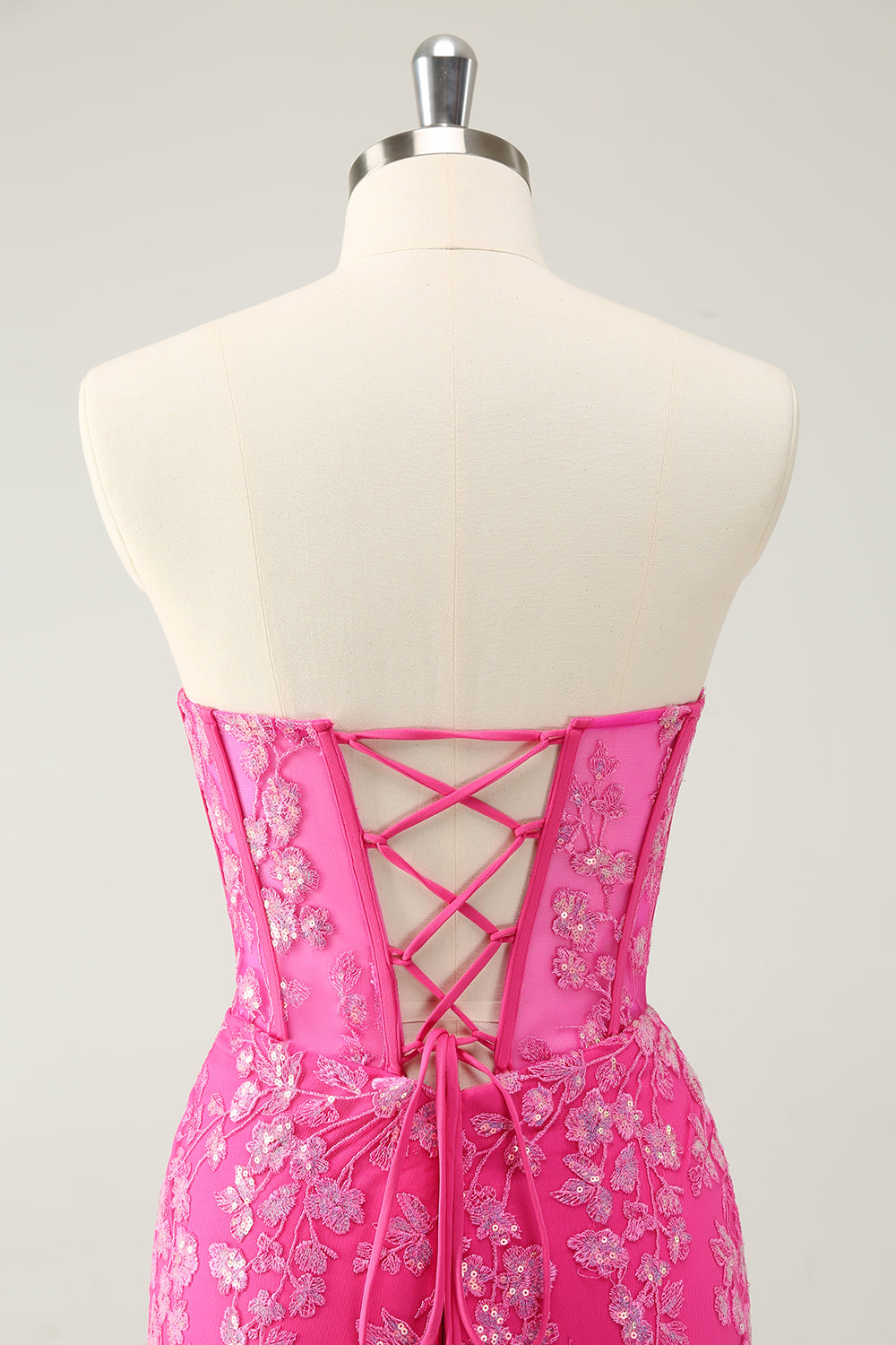 Robe de bal bustier fuchsia scintillant avec appliques