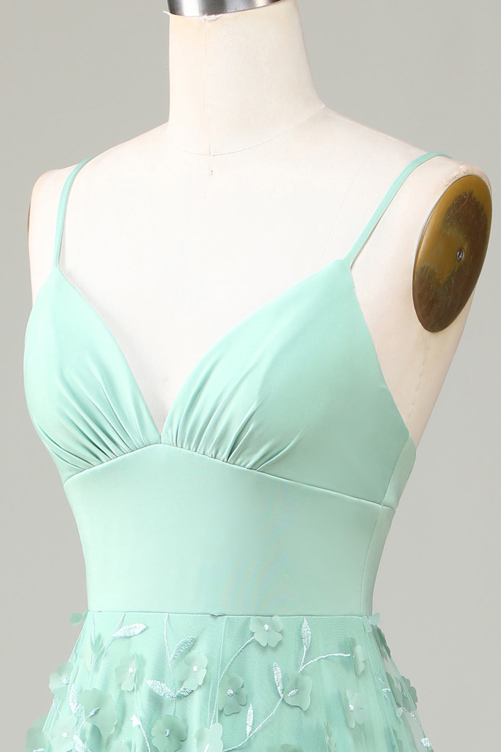 Robe de demoiselle d'honneur trapèze verte sans manches à fines bretelles