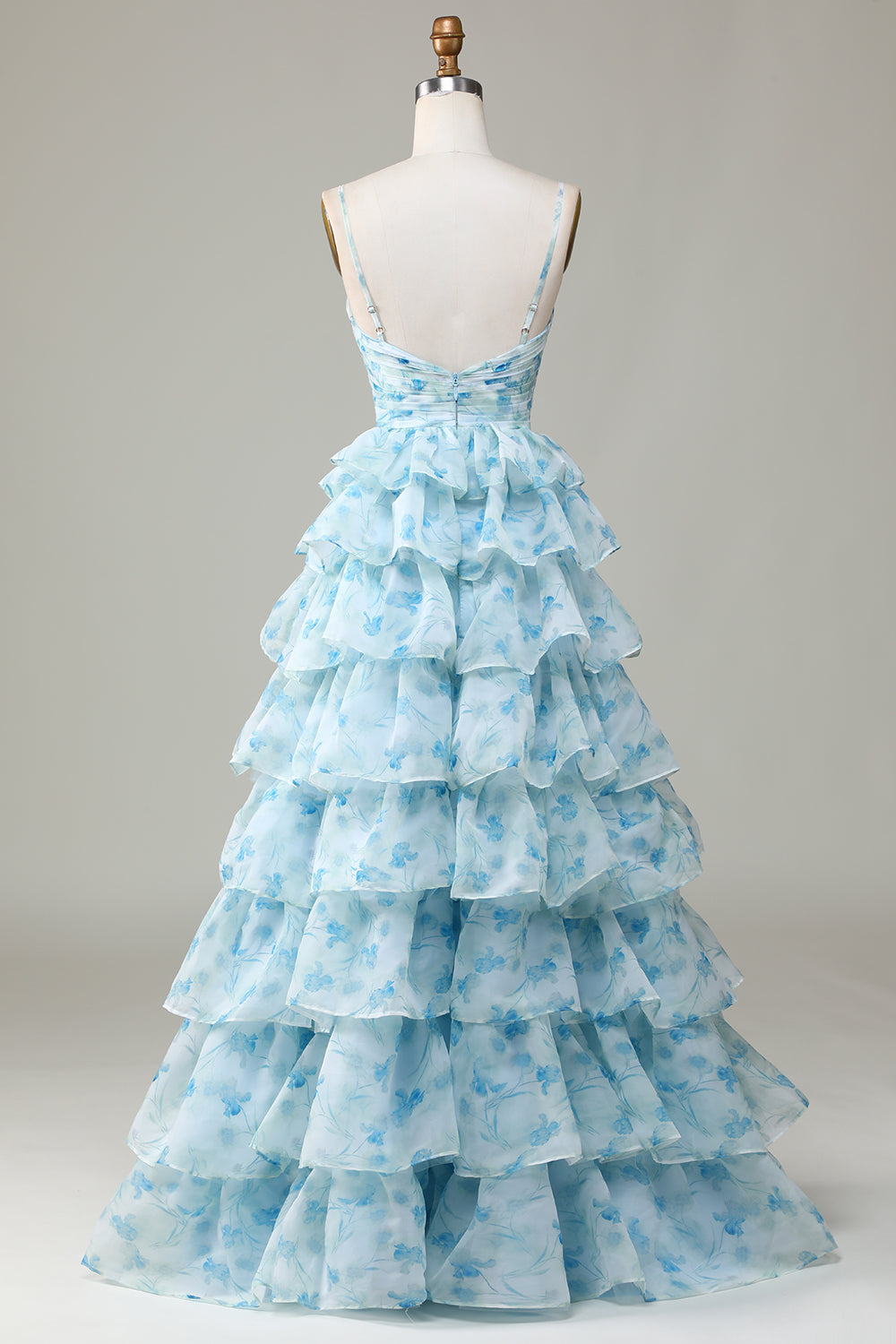 Robe de demoiselle d'honneur bleue à fines bretelles, découpes et volants