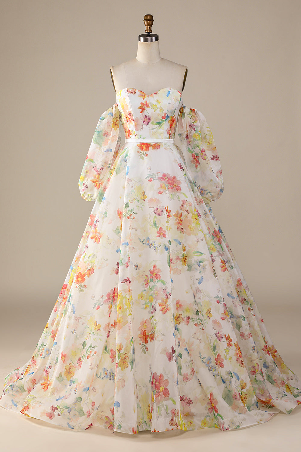 Robe de mariée A-line en ivoire avec motif floral, traîne balayage et manches