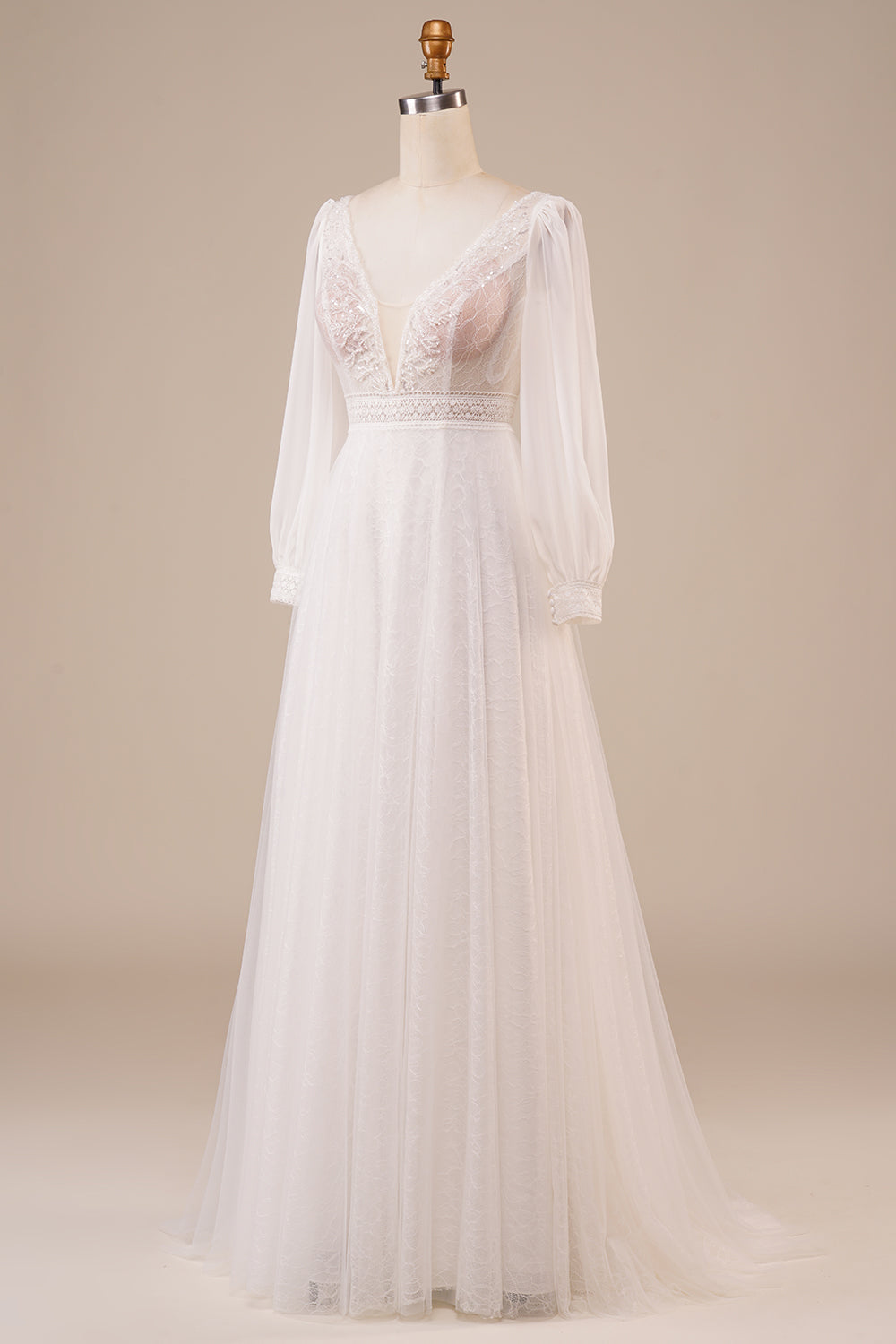 Robe de mariée ivoire évasée en tulle orné de perles avec manches