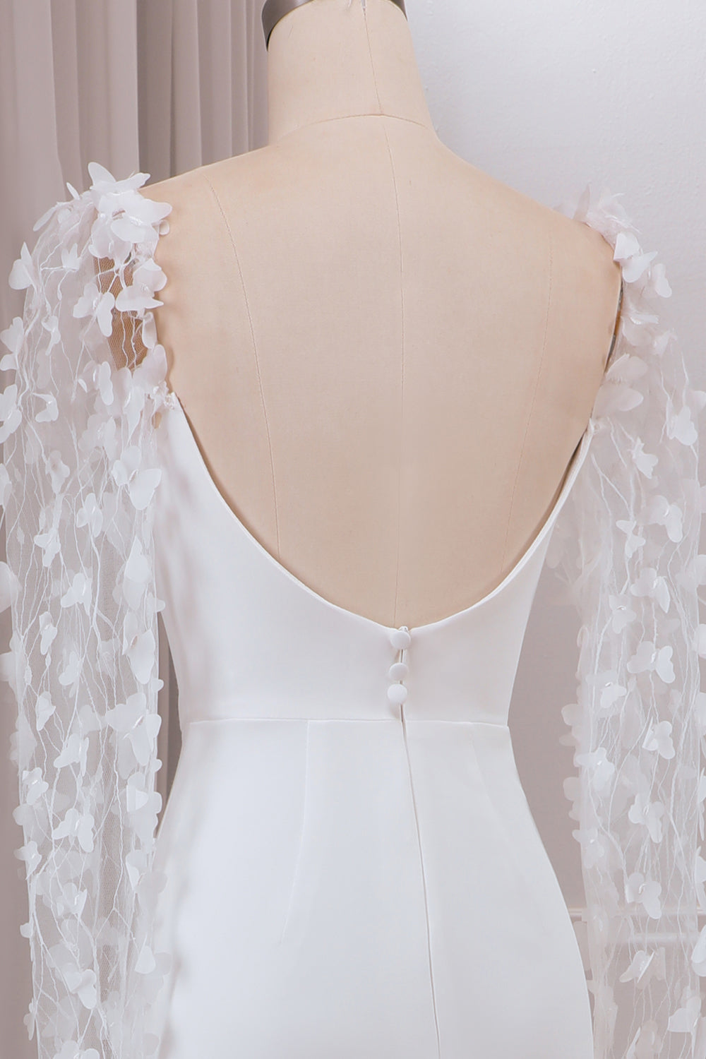 Robe de mariée sirène ivoire à manches longues avec traîne balayage et appliques 3D