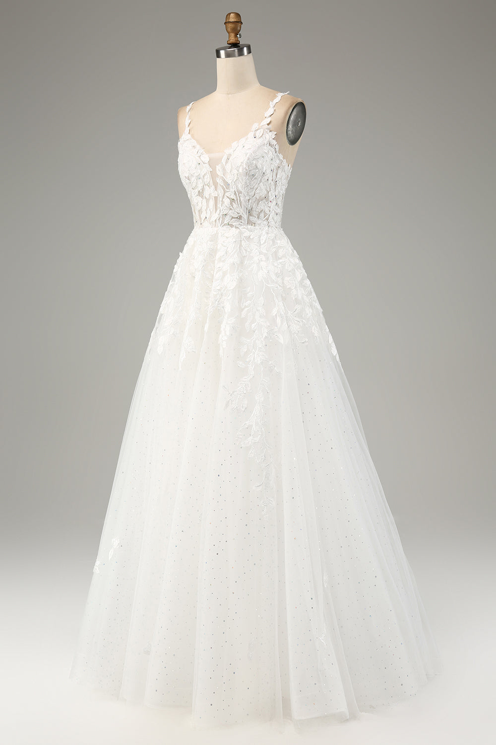 Robe de mariée ivoire trapèze en tulle avec bretelles spaghetti et appliques