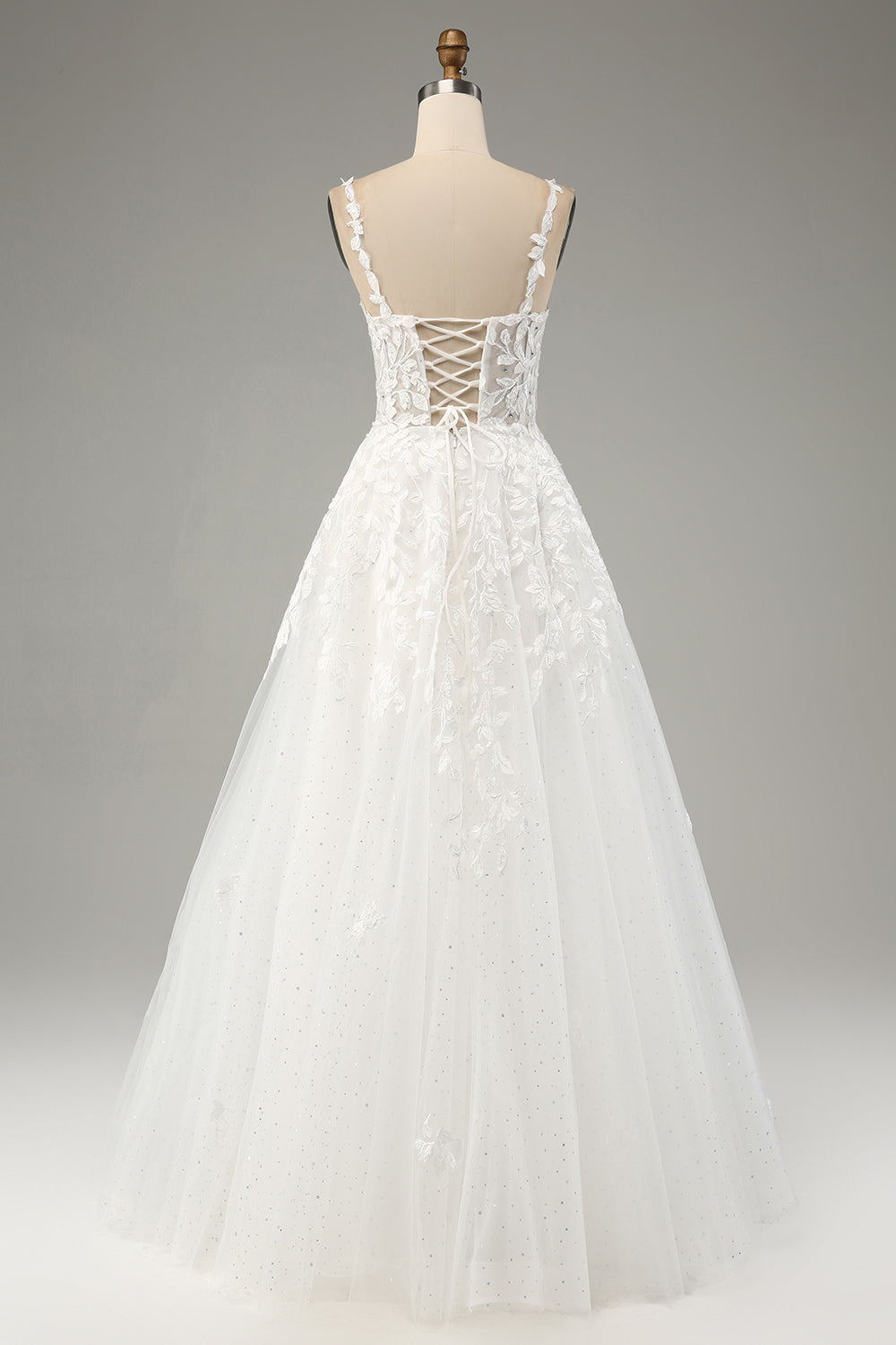 Robe de mariée ivoire trapèze en tulle avec bretelles spaghetti et appliques