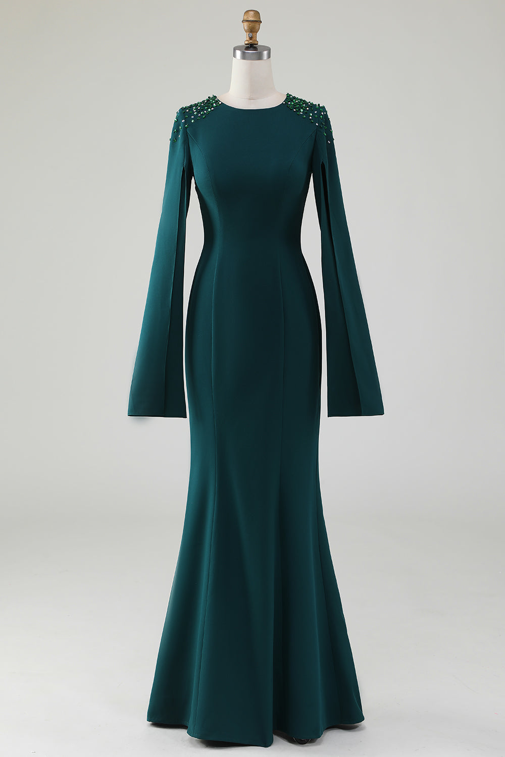 Robe longue sirène vert foncé à encolure ronde et manches cape ornées de perles