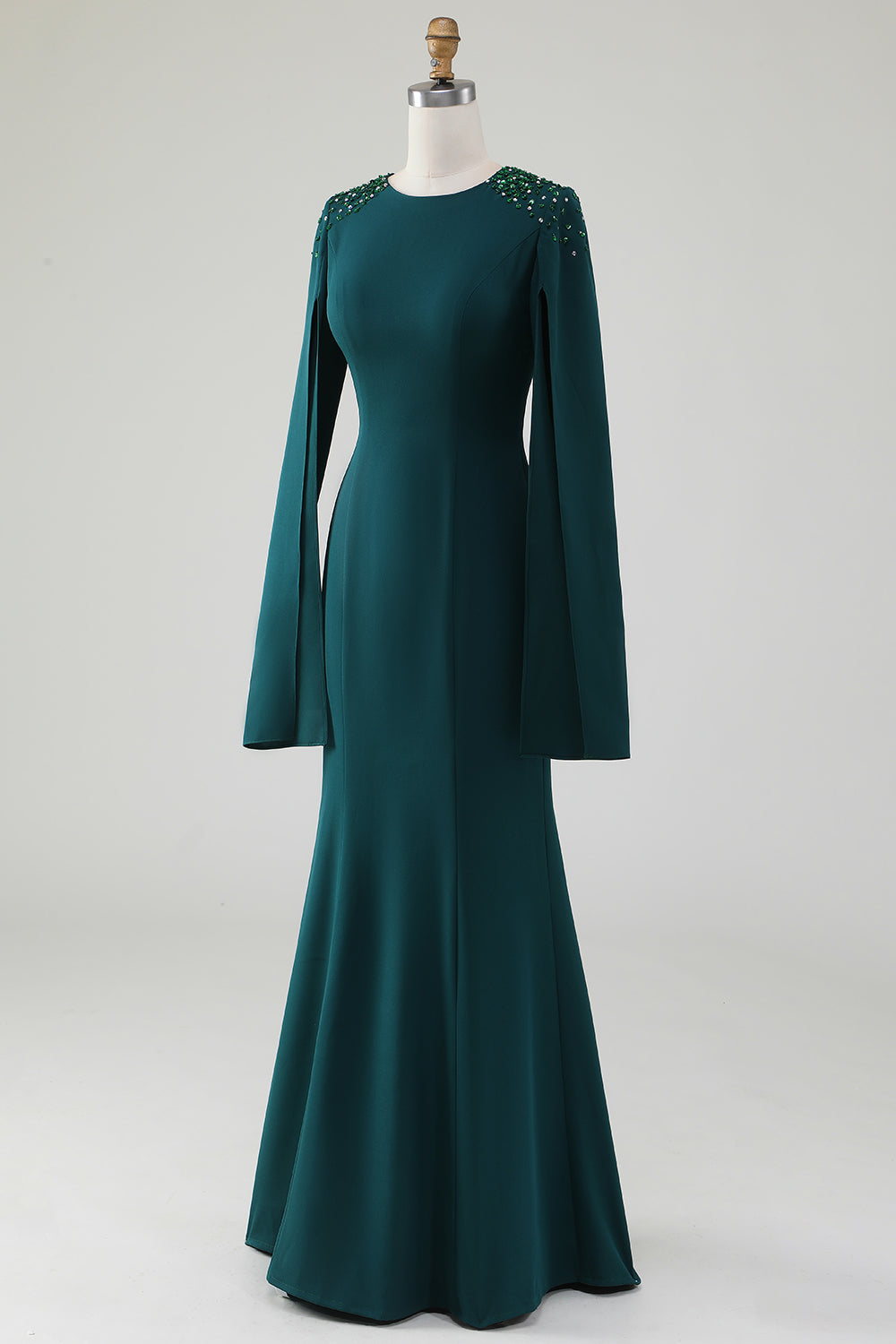 Robe longue sirène vert foncé à encolure ronde et manches cape ornées de perles