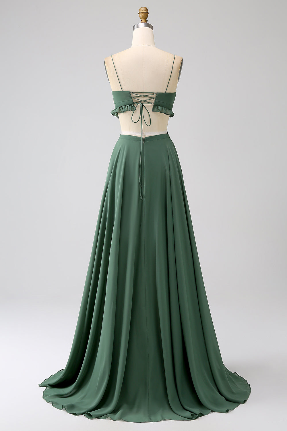 Robe longue de demoiselle d'honneur verte avec bretelles spaghetti, volants et ajours