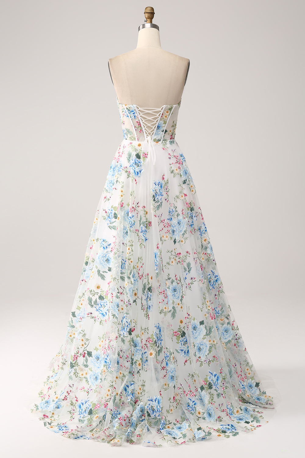 Robe de bal longue bustier coupe trapèze avec corset, motif fleur ivoire