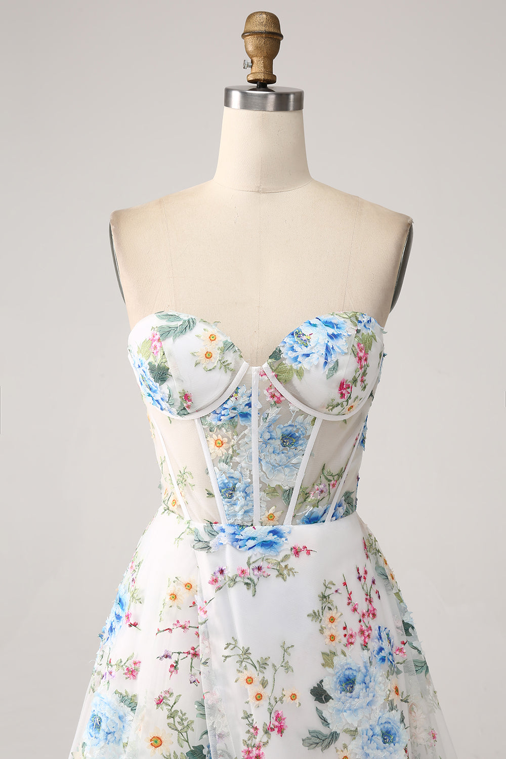 Robe de bal longue bustier coupe trapèze avec corset, motif fleur ivoire