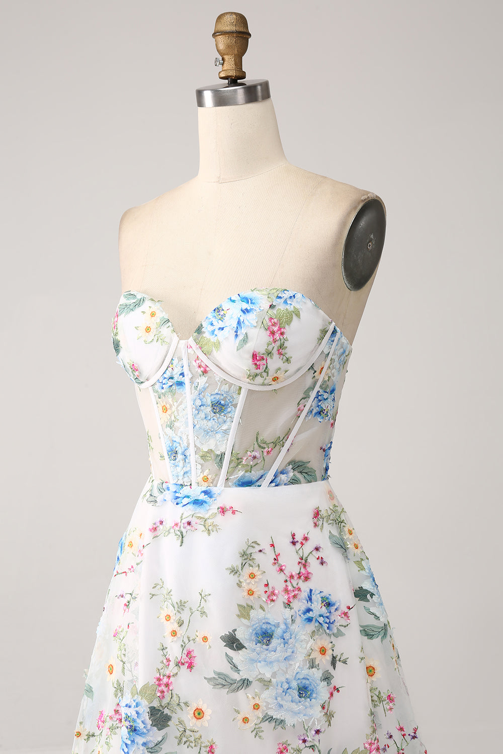 Robe de bal longue bustier coupe trapèze avec corset, motif fleur ivoire