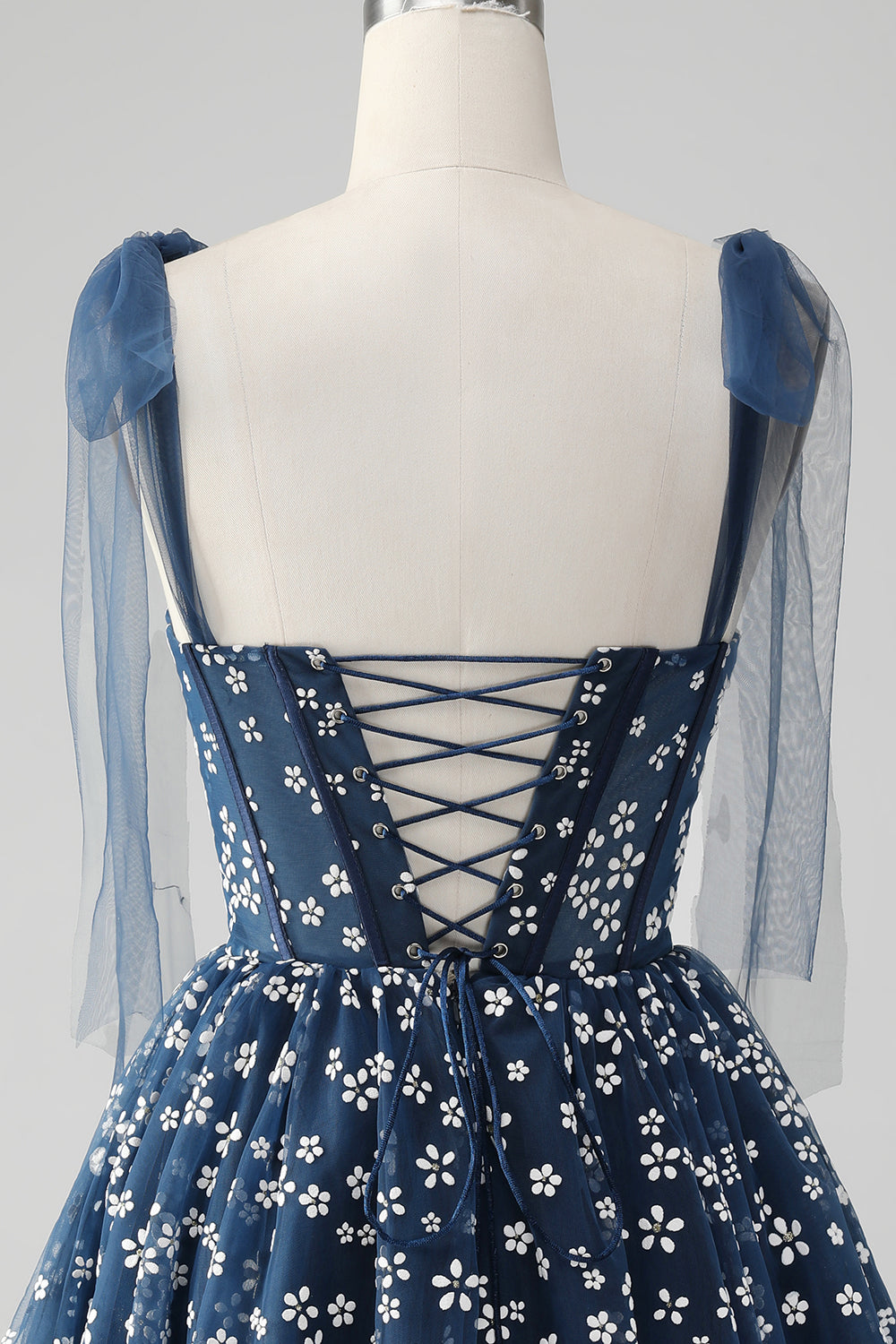 Robe courte de bal de fin d'année bleu marine ligne A à bretelles spaghetti imprimée avec corset