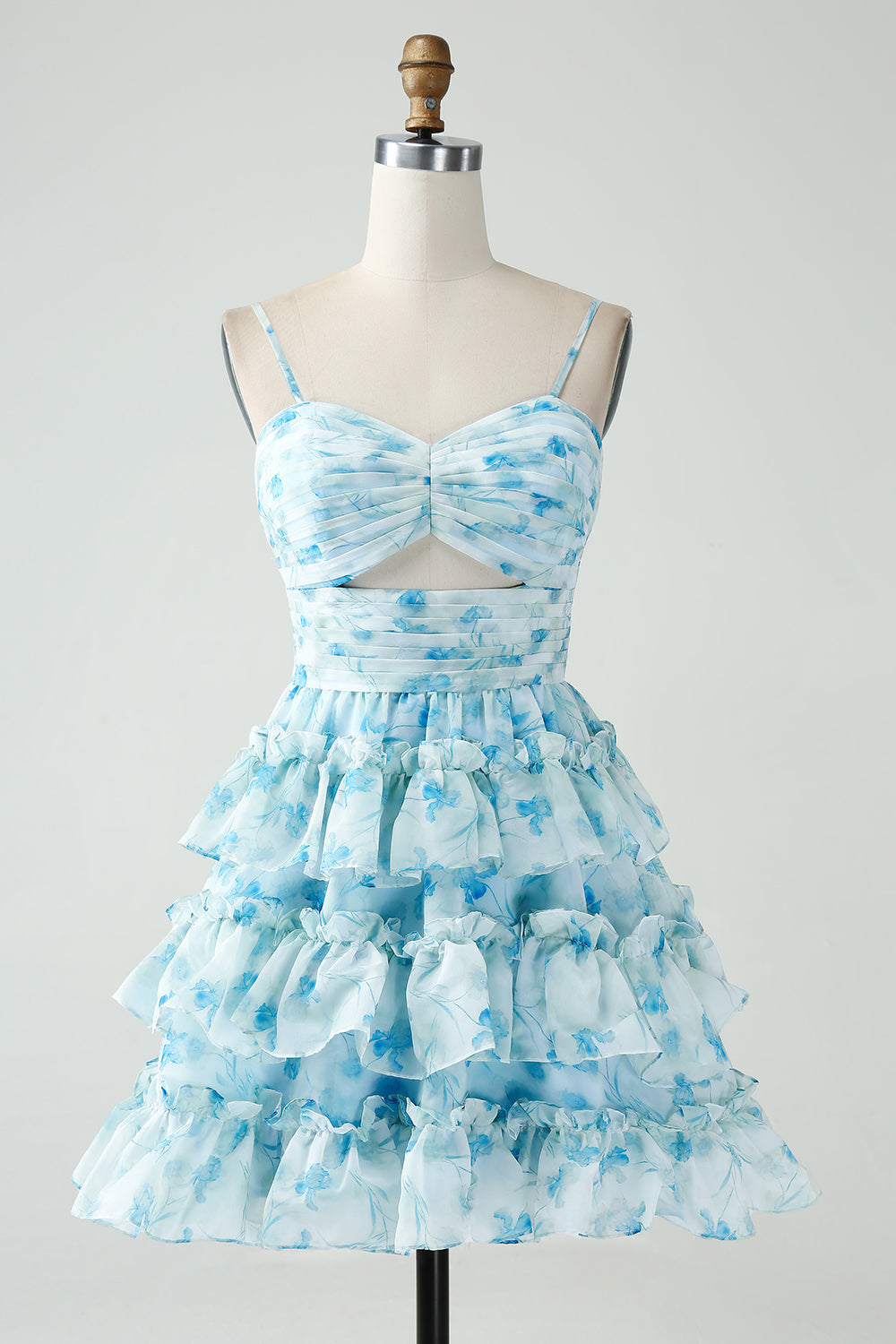 Robe courte de bal de fin d'année florale bleue à bretelles spaghetti et à volants de forme trapèze