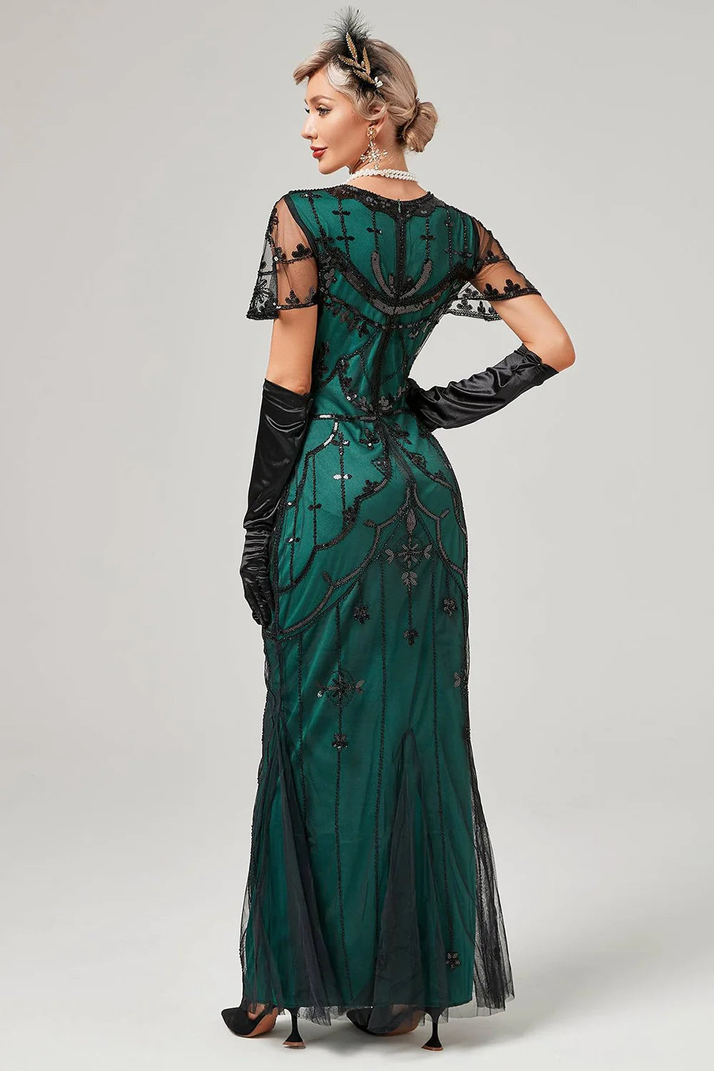 Robe longue à paillettes noires années 1920