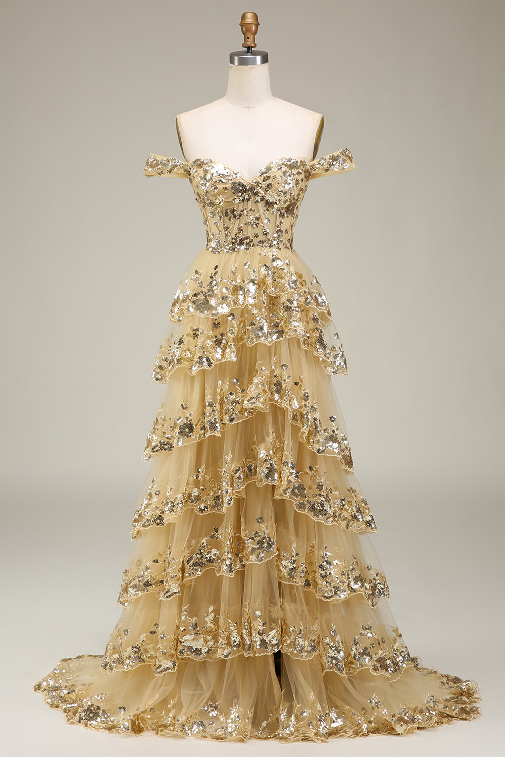 Robe de bal bustier dorée à volants et fendue
