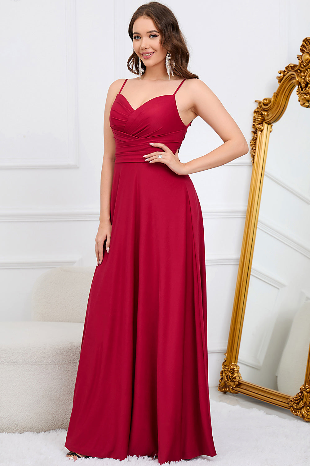 Robe longue de demoiselle d'honneur vert foncé coupe trapèze à bretelles spaghetti