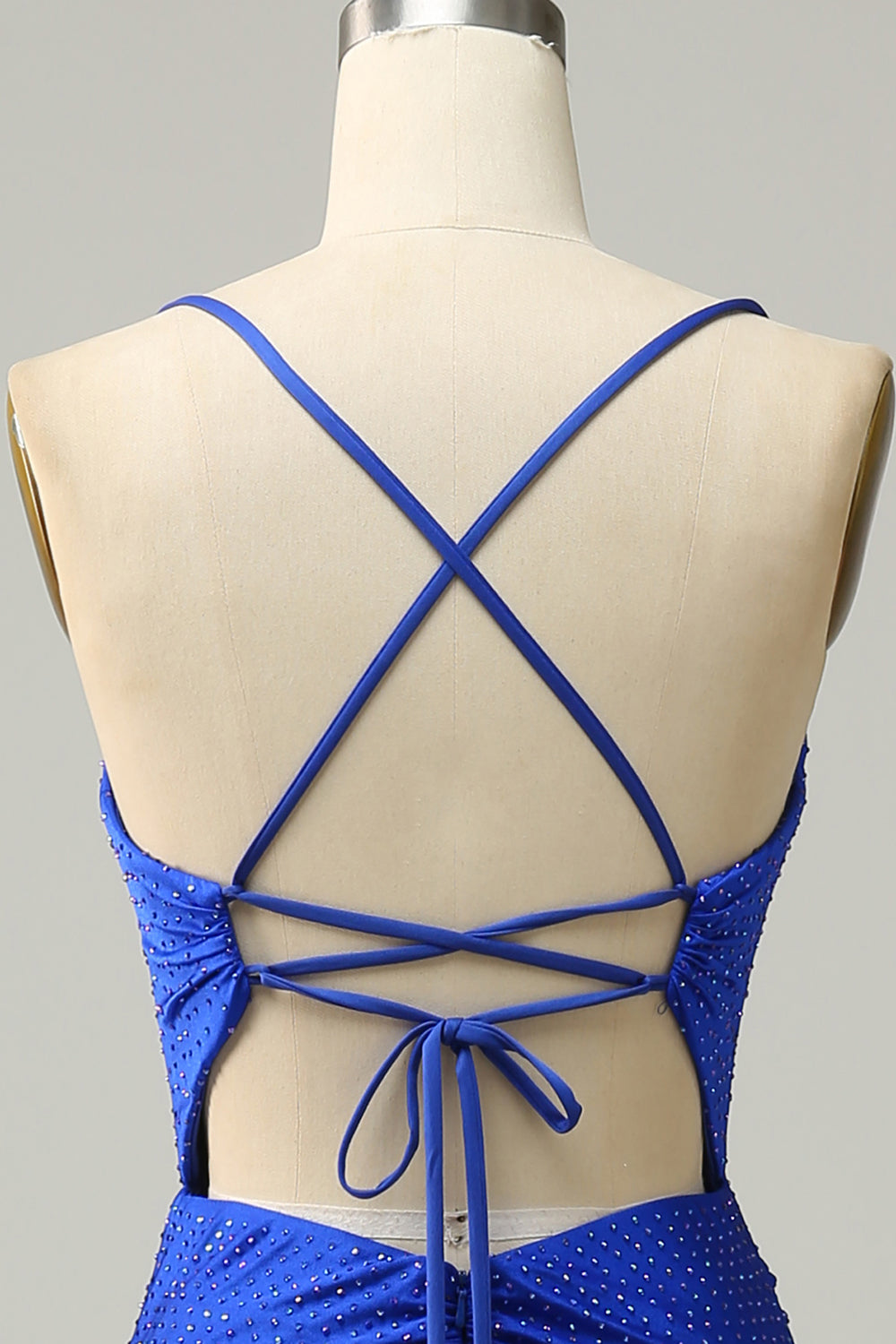 Robe de bal longue sirène bleu roi à bretelles spaghetti et perles
