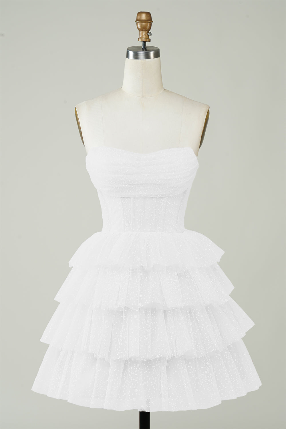 Petite robe blanche étagée style corset à paillettes