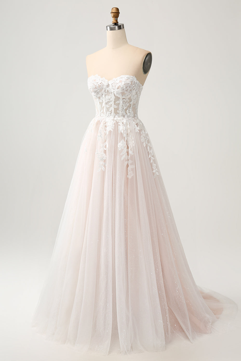 Robe de mariée bustier coupe trapèze blanche et scintillante avec dentelle appliquée