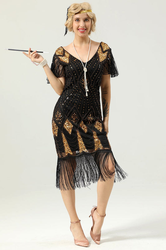 Vestido dorado con flecos estilo años 20