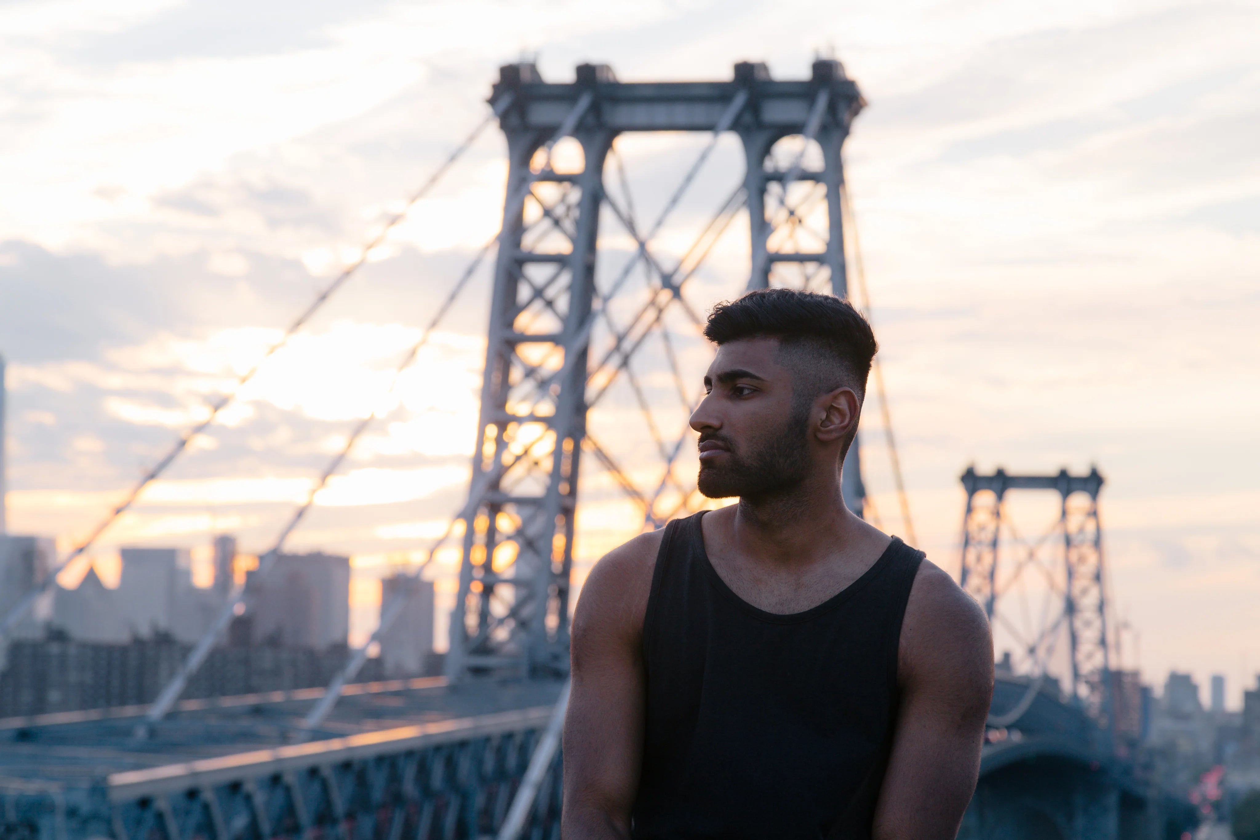 files/man-on-new-york-city-bridge_4ed64c4d-c295-43fb-98ac-934d4b111699.webp