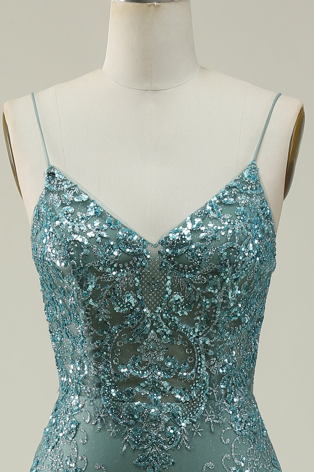 Robe de bal longue verte sirène à fines bretelles avec fente sur le devant