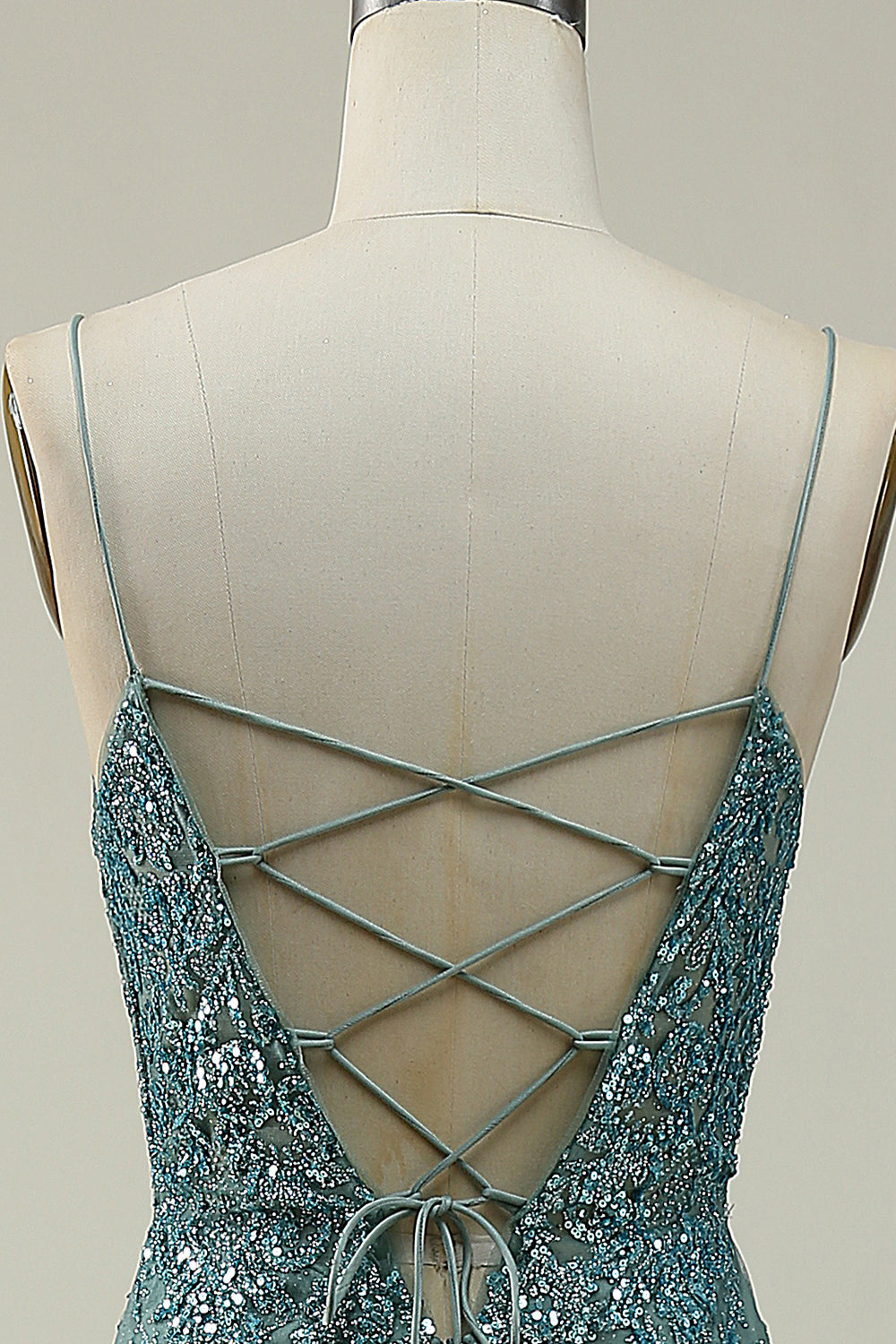 Robe de bal longue verte sirène à fines bretelles avec fente sur le devant