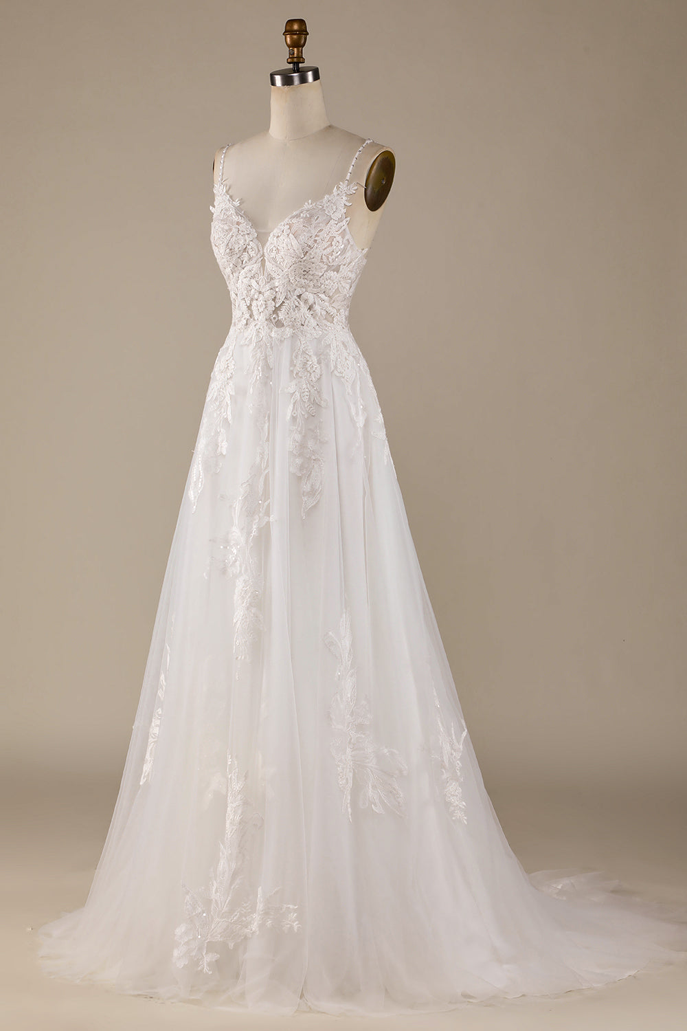 Robe de mariée ivoire trapèze en tulle avec bretelles croisées dans le dos