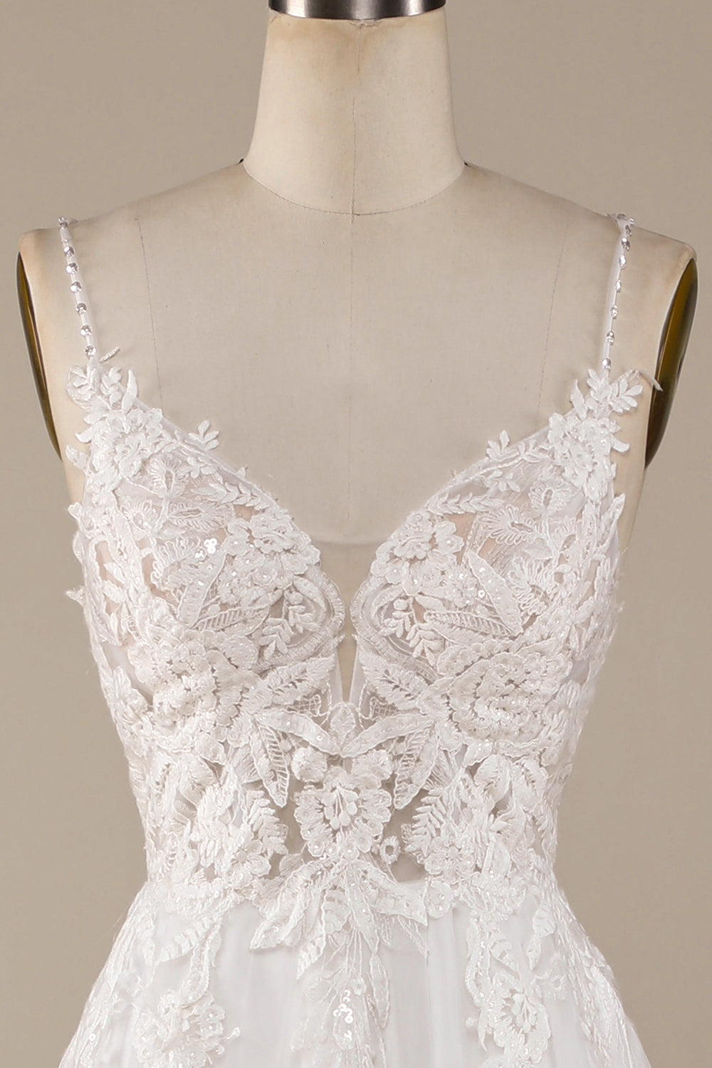 Robe de mariée ivoire trapèze en tulle avec bretelles croisées dans le dos