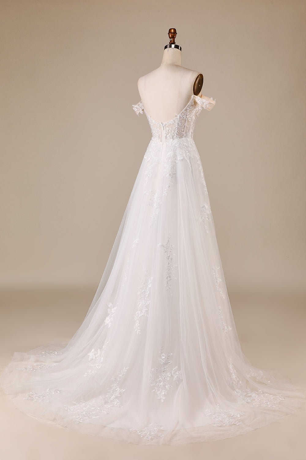 Robe de mariée bustier en tulle ivoire détachable épaules dénudées